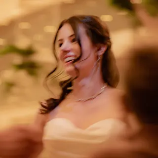 Bride enjoying the wedding dance